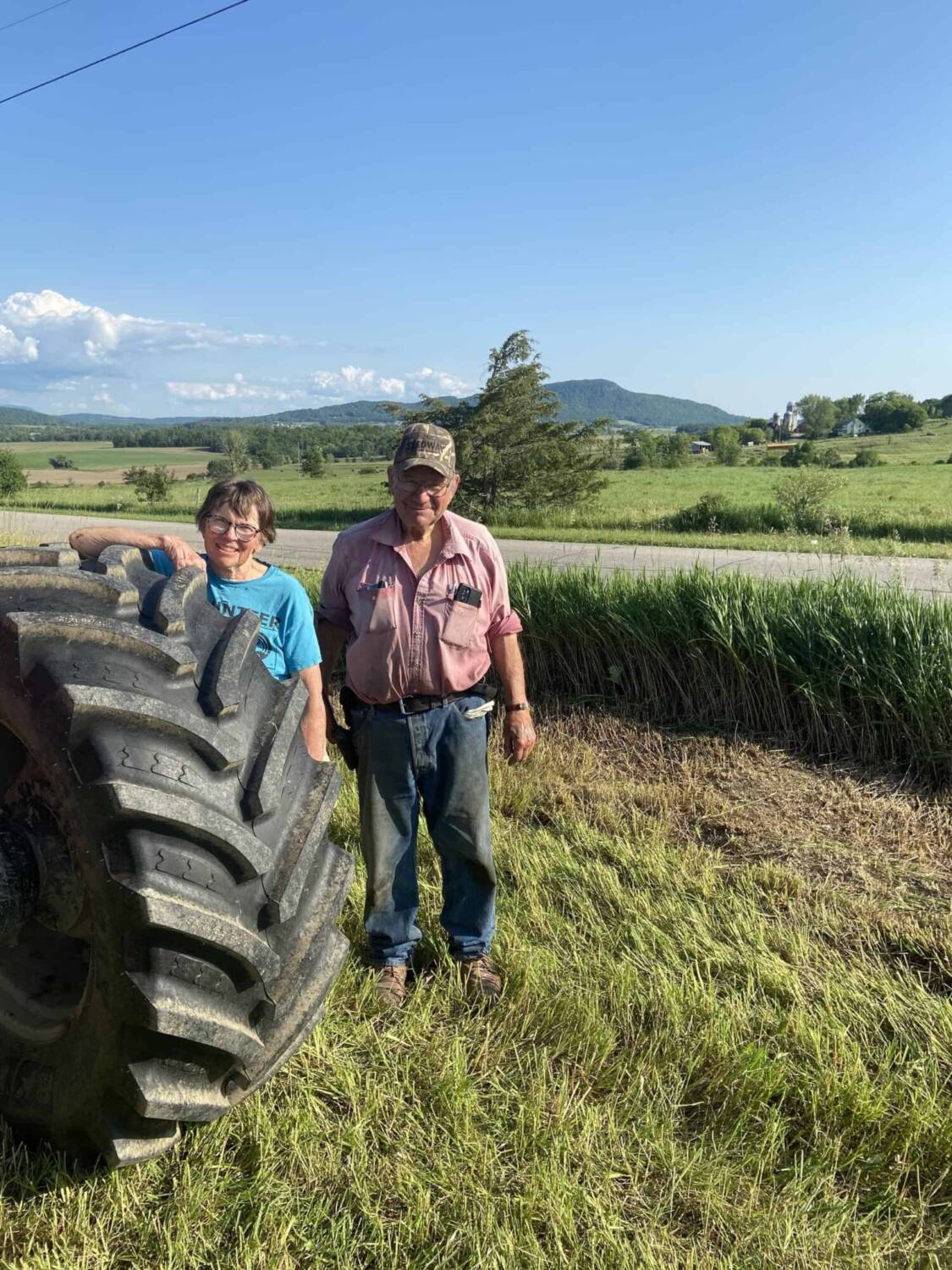 Patz Customers - Dale & Alma Briggs outside on farm