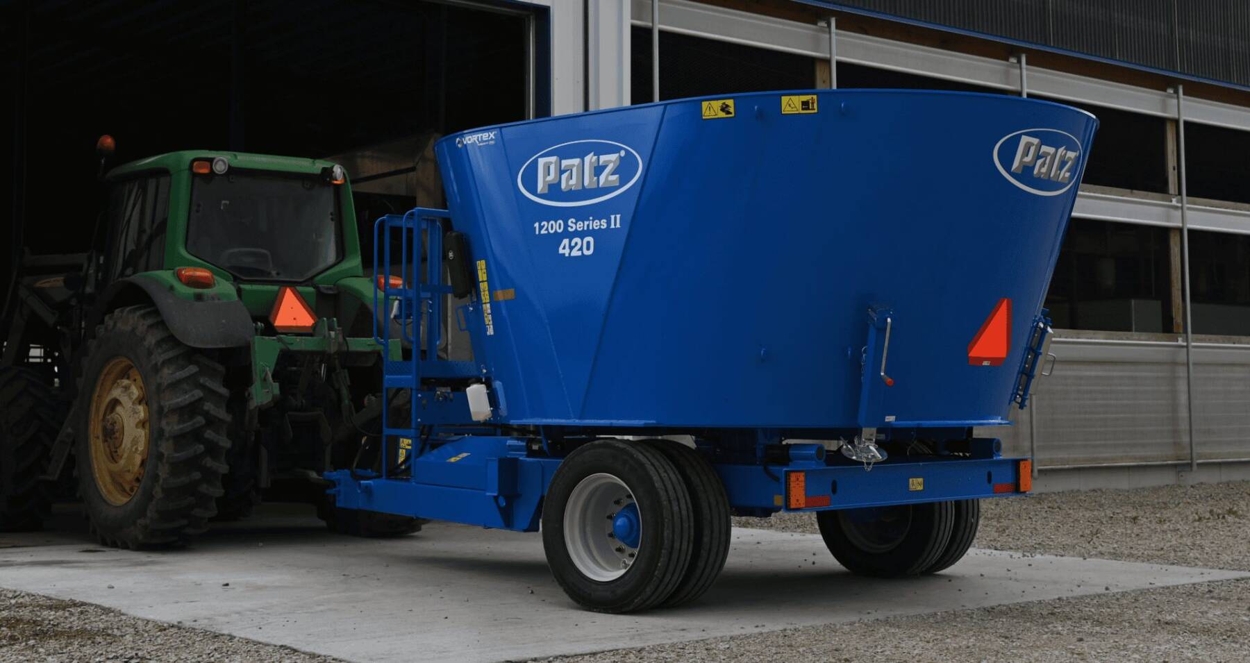 Patz 1200 Series II 420 Vertical Mixer entering barn